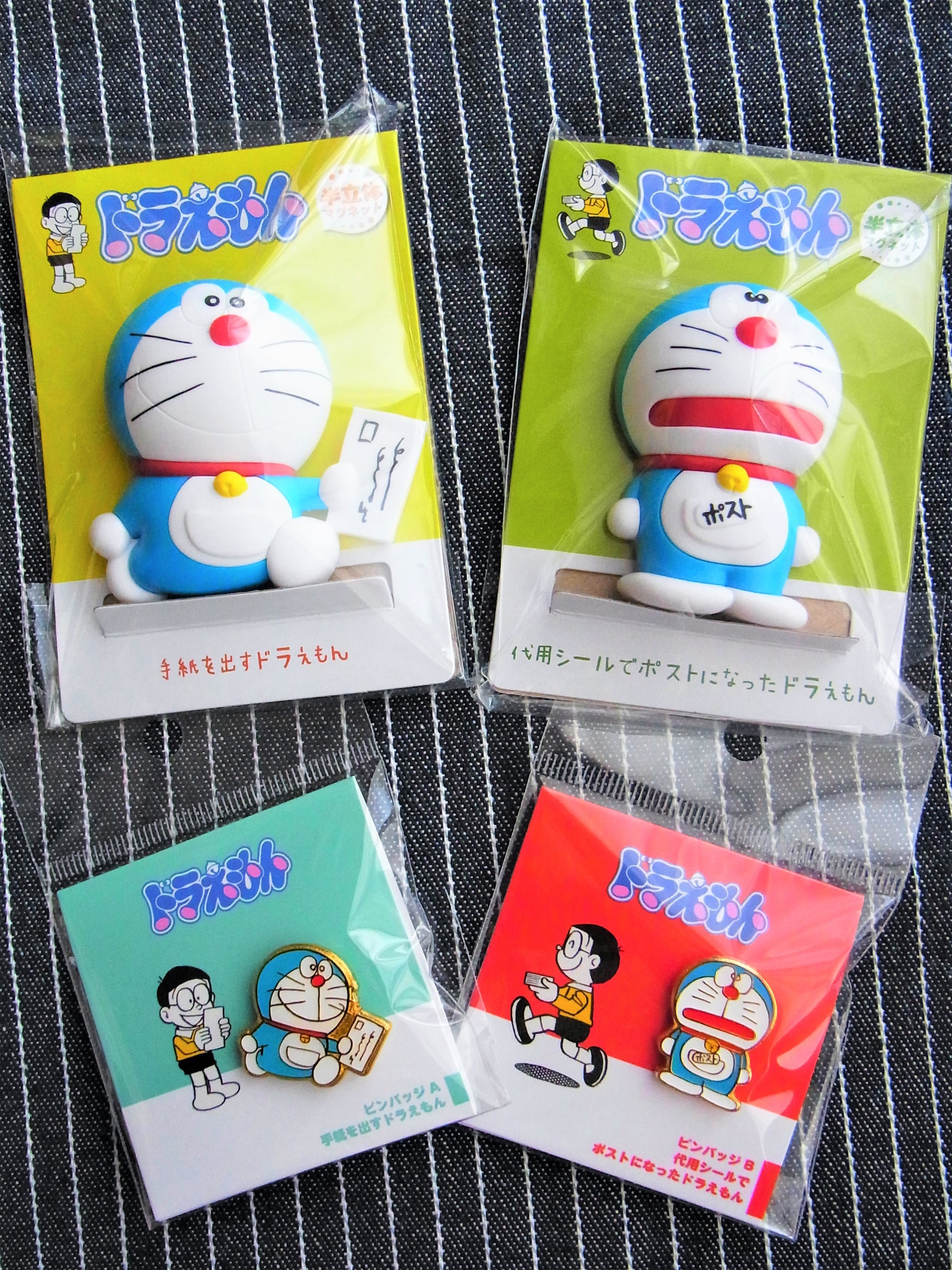代用シールでポストになった ドラえもん 郵便局50周年 限定 貯金箱